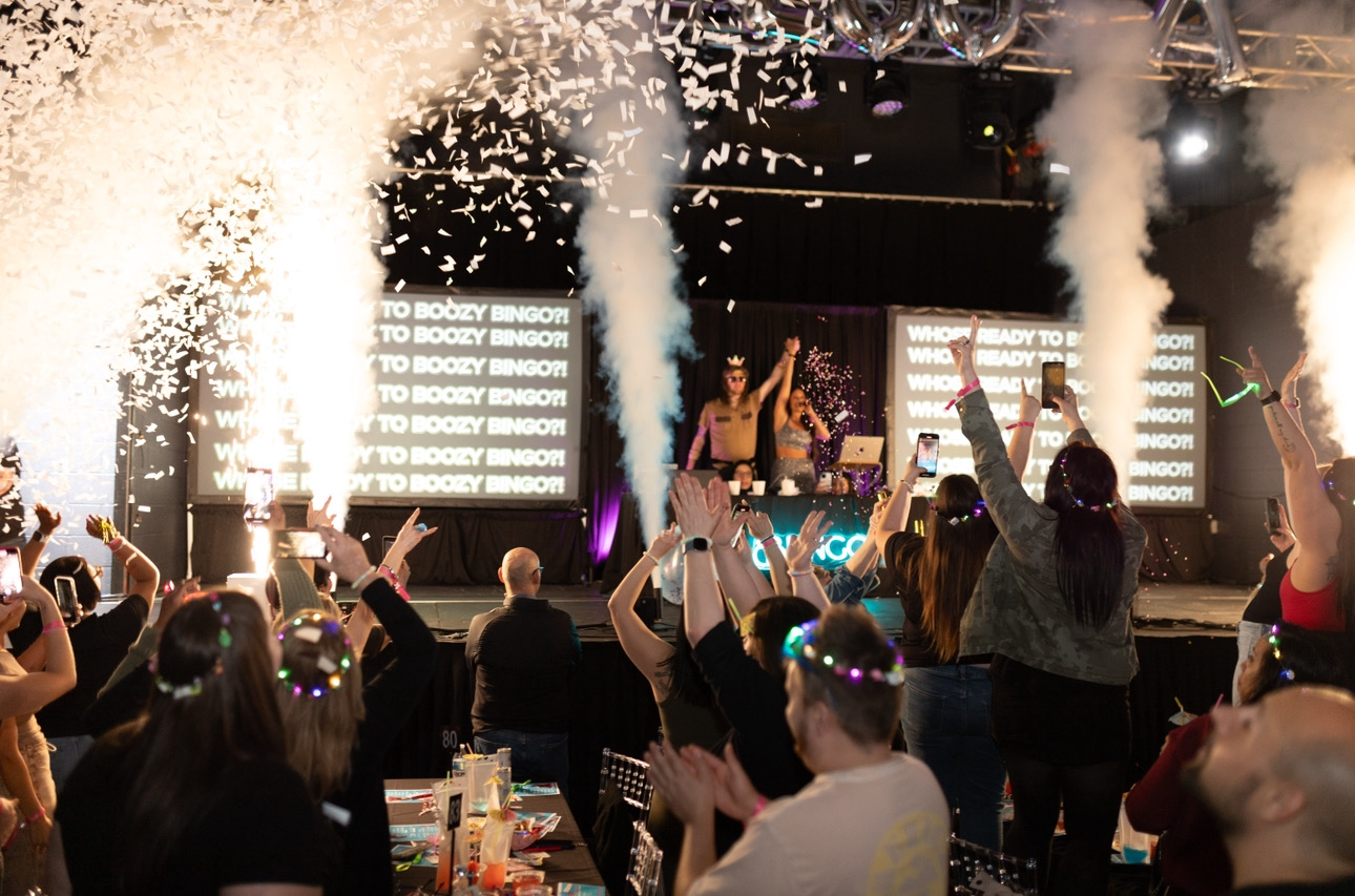 Crowd celebrating with glow sticks at BB’s Bingo party