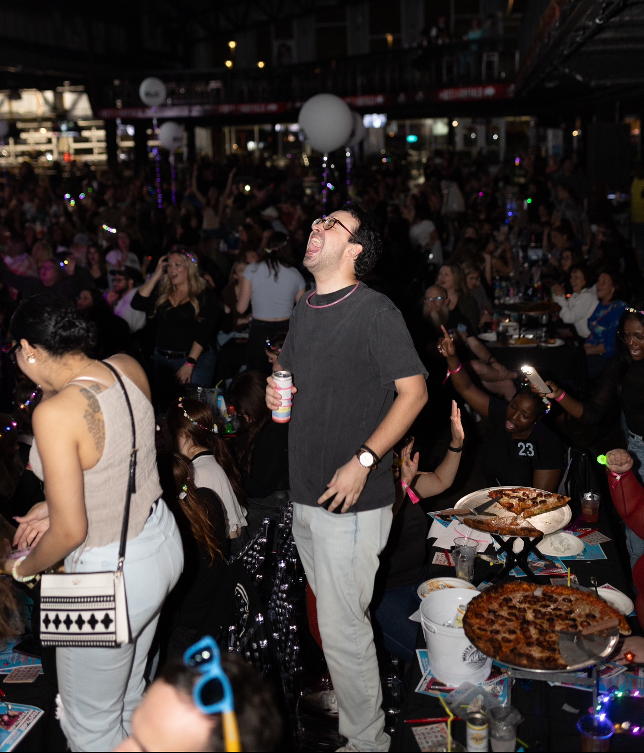 People enjoying drinks and dancing at a BB’s Bingo night out